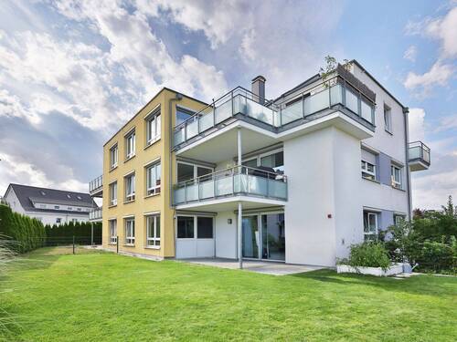 Bild 1 - Moderne 4-Zimmer-Wohnung mit großem Gartenanteil in Südausrichtung