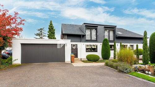 Außenansicht 1 - EFH bzw. ZFH in ruhiger Lage von Pirmasens-Erlenbrunn mit modernisierten Details und schönem Garten