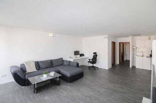 Wohnzimmer_Küche (2) - Gepflegten 2-Zimmer-Eigentumswohnung mit Balkon in Wolfsburg-Westhagen- Erbbaugrundstück