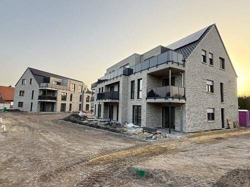 Gesamtansicht - Moderne Erdgeschosswohnung in Werlte zu verkaufen, 3-Zimmer-Wohnung mit Terrasse und kleinem Garten!