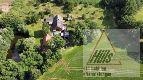 Luftansicht - Mehrfamilienhaus, Wohnhaus in Lienen