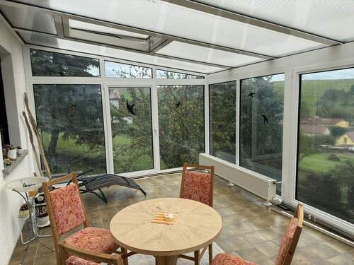 Wintergarten mit Blick ins Grüne - 