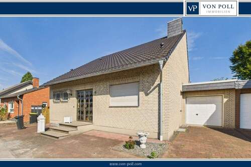 Titelbild - Zeitlose Eleganz in Split-Level-Bauweise - mit Kamin, Garage und Dachausbauoption