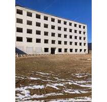 2 Mehrgeschossbauten in Chemnitz im Rohbauzustand mit Projekt