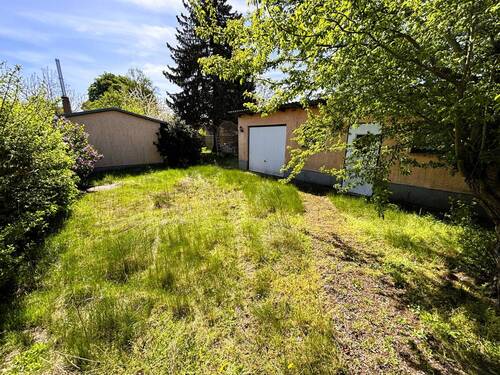 Wohnhaus mit Garage - Bungalow mit viel Potenzial auf großem Grundstück in der idyllischen Kleinseenplatte