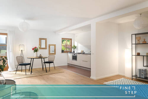 FINESTEP Immobilien GmbH - Große 2-Zimmer-Wohnung mit großem Balkon in idyllischer Lage von Schleching-Ettenhausen