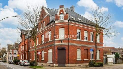 Außenansicht 1 - Großzügige Hochparterre-Wohnung mit überdachter Terrasse und Garage - vielseitig nutzbar
