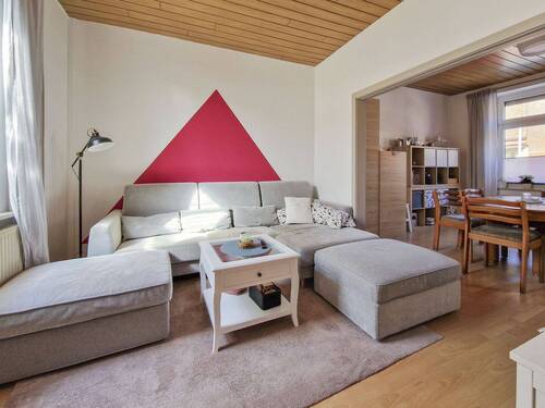 Wohnzimmer im Erdgeschoss - 4 Zimmer Einfamilienhaus zum Kaufen in Nortorf