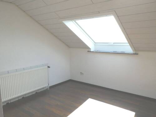 Zimmer im Dachgeschoss - 