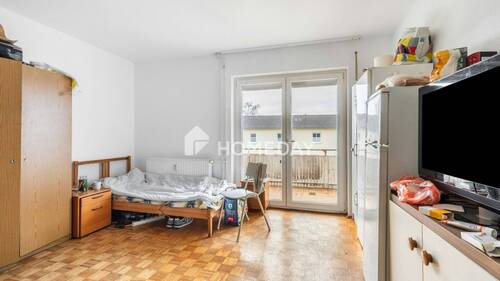1. OG Schlafzimmer 1 - 