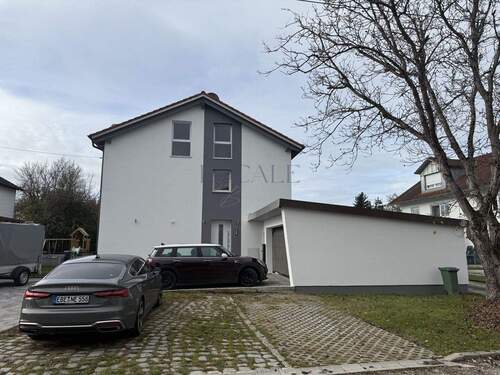 Hausanssicht - Helle 2-Zimmer-Souterrain-Wohnung in ruhiger Lage