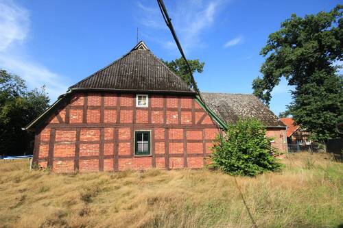 Gartenansicht - Mehrfamilienhaus, Wohnhaus mit 158,40 m² in Kirchlinteln zum Kaufen