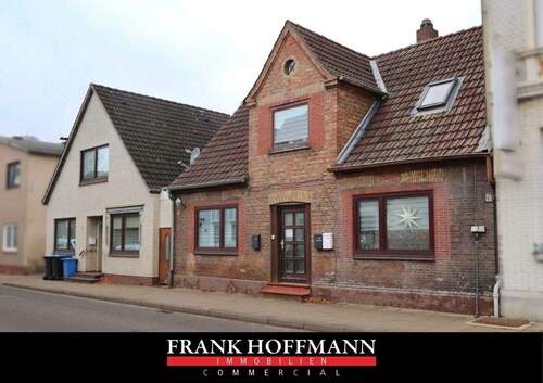 V10650 Titelbild - 2 Mehrfamilienhäuser im Verbund mit 11 Einheiten in Barmstedt