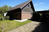 Hausansicht mit Carport - Einfamilienhaus mit 144,00 m&sup2; in Neuenhagen bei Berlin zum Kaufen