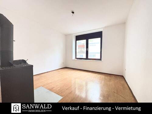 Bild 1 - Günstige 2,5 Zimmer Wohnung mit eigenem Garten