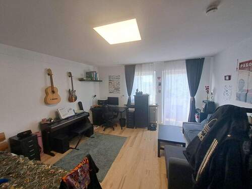 Zimmer 1 - 2 Zimmer Etagenwohnung in München