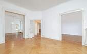 Zentraler Salon mit großen Durchgängen in die anderen Räume - Etagenwohnung mit 151,00 m&sup2; in Berlin zum Kaufen