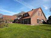 Einfamilienhaus mit Einliegerwohnung in Wapeldorf - Ankommen, Durchatmen, Wohlfühlen: Ihr Logenplatz im Grünen in Rastede-Wapeldorf