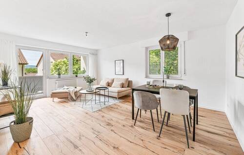 Möblierungsbeispiel Wohnzimmer - 3 Zimmer Wohnung mit Balkon und 2 Garagen