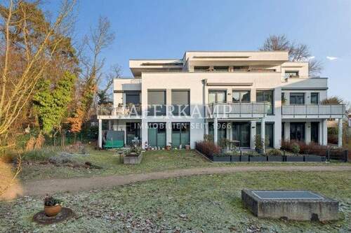 Haus 2 hinten - Gut vermietete 3-Zimmer-Neubau-Wohnung in gefragter Lage Neugraben-Fischbek