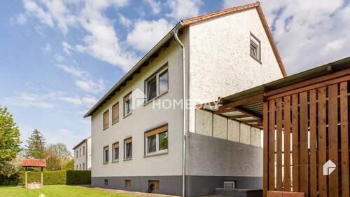Außenansicht 3 - Voll vermietetes Mehrfamilienhaus mit großem Garten, Terrasse und Loggia in idyllischer Lage