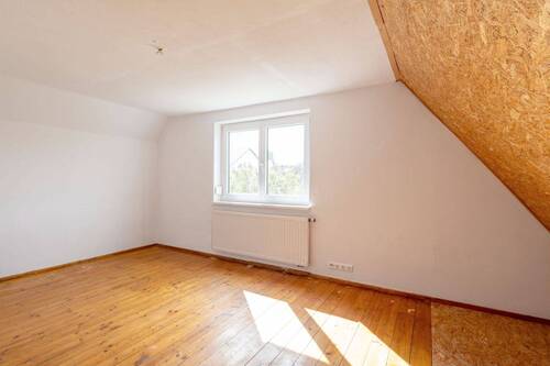 Schlafzimmer Südseite im Dachgeschoss - 