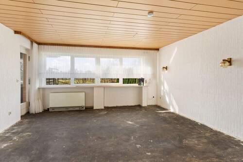 Wohnzimmer - Bungalow mit 126,30 m&sup2; in Wietze zum Kaufen