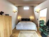 Gemütliches und gieblhoch offenes Schlafzimmer - 