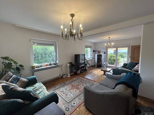 Wohnzimmer EG - 6 Zimmer Einfamilienhaus zum Kaufen in Kaiserslautern / Morlautern