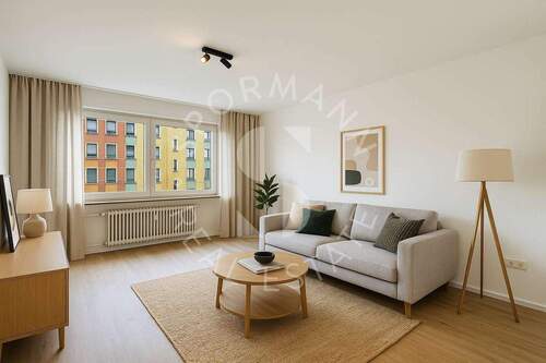 Wohnzimmer (virtuell möbliert) - 3 Zimmer Etagenwohnung in Düsseldorf