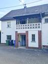 Vorderansicht - 6 Zimmer Mehrfamilienhaus, Wohnhaus zum Kaufen in Puderbach VG