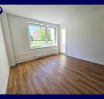Freude am Wohnen - helle 3 Zimmer mit Balkon + Blick ins Grüne, Parkett, Tageslichtbad, Einbauküche - Kiel Pries