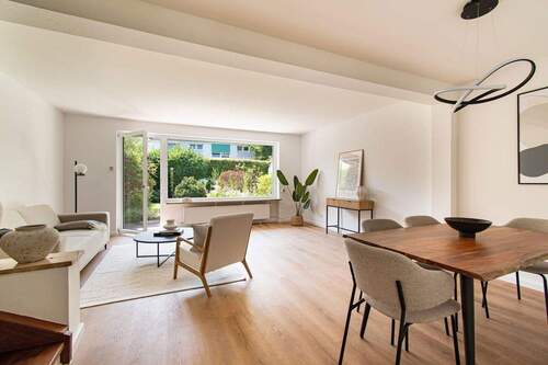 Wohnzimmer - Moderne 3 Zimmerwohnung mit eigenem Garten