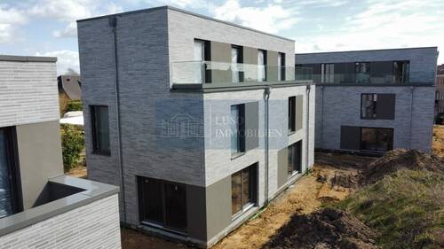 5 - Seitliche Ansicht der Immobilie - 