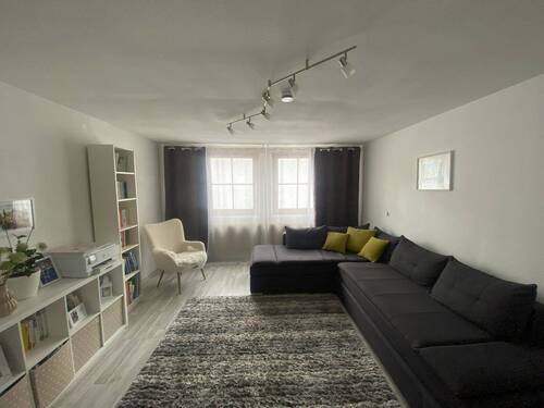 Wohnzimmer - 4-Zimmer-Wohnung im Stadtzentrum