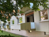 Rückansicht mit Balkon - 4 Zimmer Etagenwohnung in Mannheim / Gartenstadt