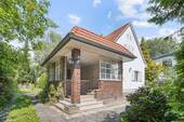 Bild 1 - Großes Einfamilienhaus mit Keller und ausbaufähiger Garage