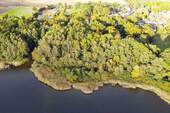 Luftaufnahme Rückansicht - Großes Waldgrundstück am Großen Schauener See
