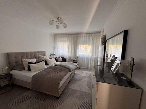 Schlafzimmer - Etagenwohnung mit 65,50 m&sup2; in Gröbenzell zum Kaufen