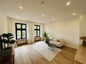 Wohnzimmer mit Altbaucharme - Kernsanierte 2 Zimmer Wohnung in Wiesbadener Bestlage