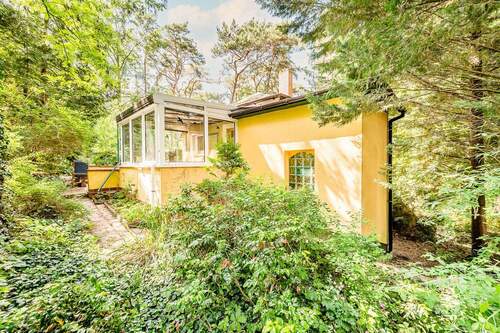 Rückansicht mit Wintergarten - 4 Zimmer Einfamilienhaus in Heidesee