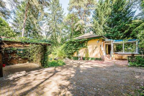 Haupteingang und Carport - Einfamilienhaus mit 98,00 m² in Heidesee zum Kaufen