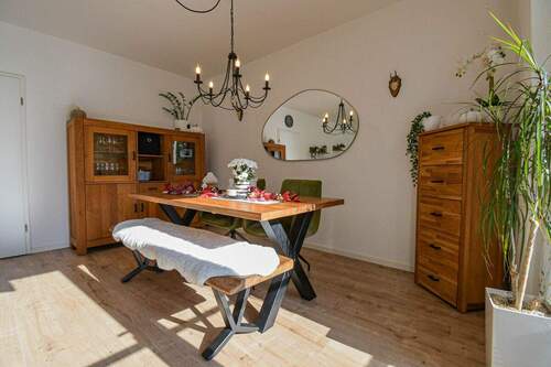 Wohnzimmer - Doppelhaushälfte mit 120,00 m² in Edewecht zum Kaufen