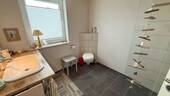 Bad mit ebenerdiger Dusche - 
