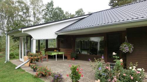 TEILÜBERDACHTE TERRASSE - 