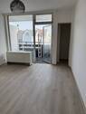Wohnzimmer - Renovierte 2-Zimmer-Stadtwohnung mit 2 Balkonen