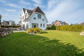 Außenansicht Garten - Zeitlose Eleganz in Wenningstedt - Einfamilienhaus der Premiumklasse