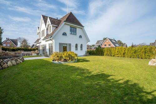 Außenansicht Garten - Zeitlose Eleganz in Wenningstedt - Einfamilienhaus der Premiumklasse