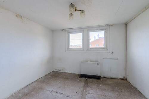 Zimmer im Dachgeschoss - 