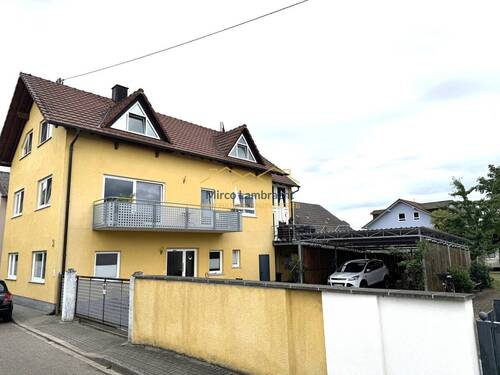 Gesamtansicht - Zweifamilienhaus in Neuenburg, im charmanten Ortsteil Grißheim, inkl. Bauplatz.